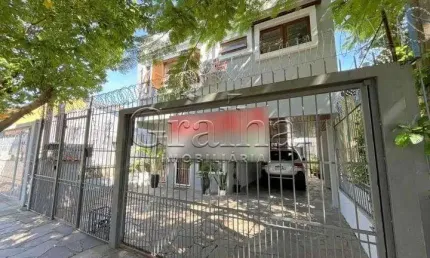 Casa com 4 quartos à venda na Rua Coronel Jaime da Costa Pereira, 376, Partenon, Porto Alegre por R$ 980.000
