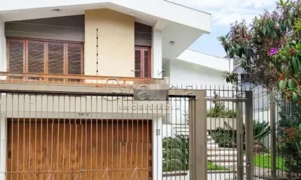Casa com 3 quartos à venda na Travessa Bermudas, 67, Jardim Lindóia, Porto Alegre por R$ 1.380.000
