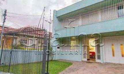 Casa com 3 quartos à venda na Rua Fagundes Varela, 83, Santo Antônio, Porto Alegre por R$ 750.000