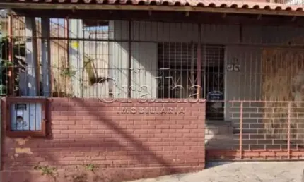 Casa com 4 quartos à venda na Rua Euclydes da Cunha, 71, Partenon, Porto Alegre por R$ 648.000