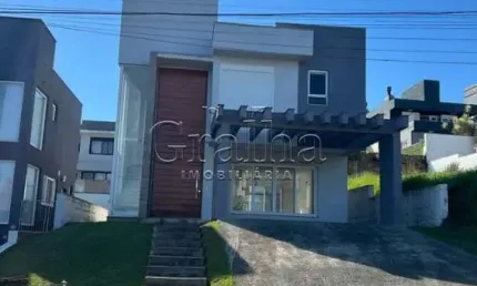 Casa em condomínio fechado com 3 quartos à venda na Avenida Senador Salgado Filho, 8500, Querência, Viamão por R$ 1.500.000