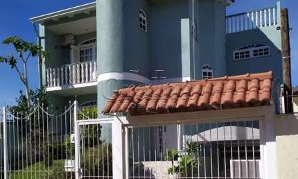 Casa com 3 quartos à venda na Rua Graciano Azambuja, 341, Partenon, Porto Alegre por R$ 1.150.000