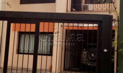 Casa com 3 quartos à venda na Avenida Lavras, 530, Petrópolis, Porto Alegre por R$ 1.200.000
