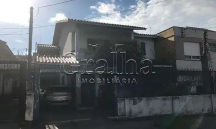 Casa com 5 quartos à venda na rua coronel jaime da costa pereira, 318, partenon, porto alegre por r$ 950.000