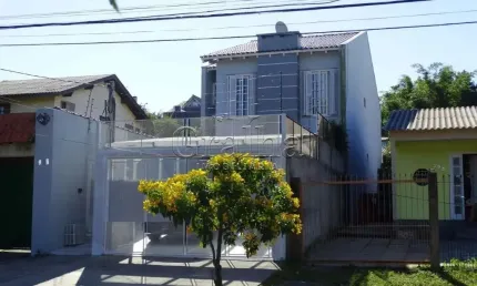 Casa em condomínio fechado com 5 quartos à venda na Rua Banco Inglês, 307, Santa Tereza, Porto Alegre por R$ 740.000