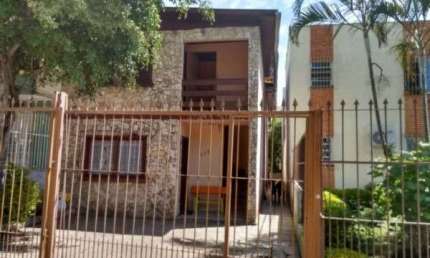 Casa com 3 quartos à venda na Rua Guilherme Alves, 705, Petrópolis, Porto Alegre por R$ 958.000