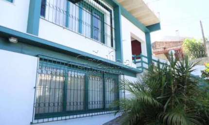 Casa com 4 quartos à venda na Rua Caixa Econômica, 307, Santa Tereza, Porto Alegre por R$ 1.200.000