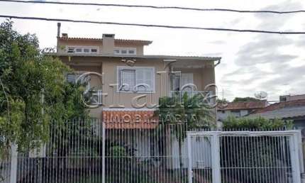 Casa com 4 quartos à venda na Rua Pedro Pereira de Souza, 117, Partenon, Porto Alegre por R$ 1.064.000