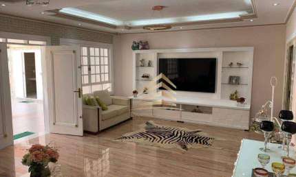 Casa com 4 dormitórios à venda, 336 m² por R$ 1.700.000,00 - Vila Assunção - Praia Grande/SP