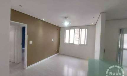Apartamento para locação no Embaré, Santos-SP: 2 quartos, 2 salas, 1 banheiro, 1 vaga de garagem, 71m². Aproveite!