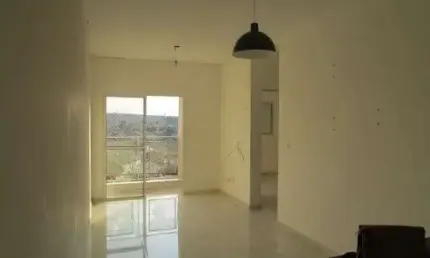 Apartamento com armários planejados, cooktop na cozinha e portaria 24h disponível para venda em Taubaté. Aceita financiamento.