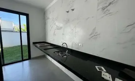 Casa com 3 dormitórios à venda, 187 m² por R$ 1.070.000,00 - Condomínio Ouro Ville - Taubaté/SP