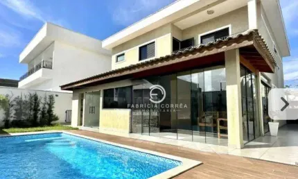 Sobrado com 3 dormitórios à venda, 252 m² por R$ 1.600.000,00 - Condomínio Ouro Ville - Taubaté/SP