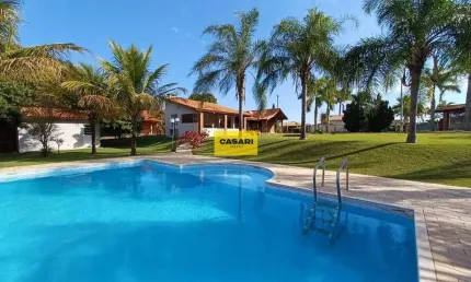 Chácara à venda no Condomínio Nova Rheata com 1.754,72 m² de terreno com Piscina e Área Gourmet.