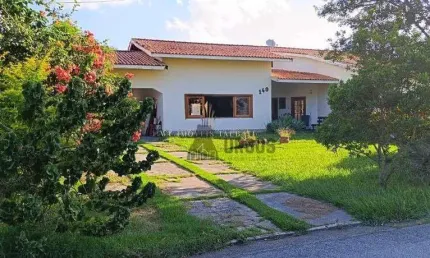 Casa com 3 dormitórios à venda, 380 m² por R$ 2.500.000,00 - Condomínio Vale do Sol - Tremembé/SP