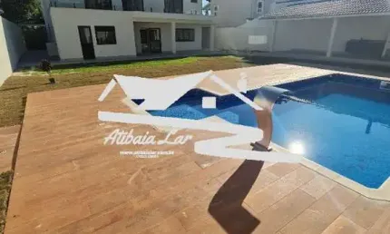 Sobrado no Condomínio Porto Atibaia em Atibaia SP.  São 6 suítes,  área gourmet,  despensa, piscina