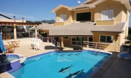 Casa no Condomínio Porto Atibaia Segurança e lazer com 5 suítes, piscina, área gourmet.