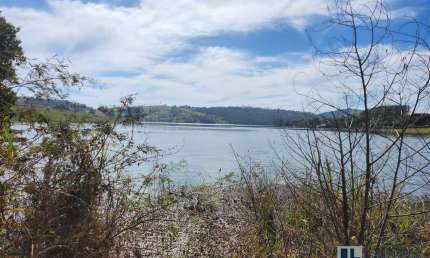 Excelente lote para venda em Cássia / Delfinopolis no Condominio Praias do Lajeado, área 1.005 m2,  com 23,5 m beira da represa