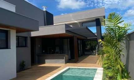 Linda casa nova para venda no charmoso Vila do Golfe, Cond. Quinta dos Ventos, 4 suites, home, gourmet e piscina em 536 m2 de área total. Lazer comple