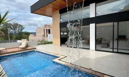 Maravilhosa casa alto padrão para venda no Condominio Morada da Fronteira em Rifaina-SP, 4 suites, gourmet e piscina em 220 m2 construidos