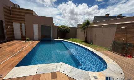 Linda casa para venda na City Ribeirão, 4 dormitorios com 2 suites, ampla área gourmet e piscina em 300 m2 construidos