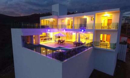 Magnifico sobrado para venda em Escarpas do Lago, linda vista, 5 suites, ampla varanda gourmet, piscina borda infinita e heliponto em 781 m2