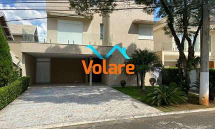 Casa em condomínio de luxo à venda: 4 quartos, 4 suítes, 3 salas, 5 banheiros, 4 vagas de garagem e 320m²
