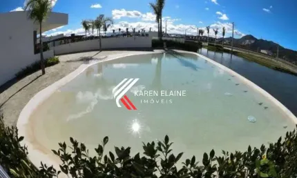 Terreno à venda em condomínio privado resort deltaville em biguaçu sc