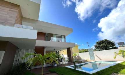 Luxuosa casa em condomínio à venda em Guarajuba, Camaçari-BA: 5 quartos, 5 suítes, 1 sala, 6 banheiros, 4 vagas de garagem, 250m².