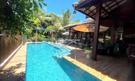 Luxuosa Casa em Condomínio à Venda em Mata de São João-BA, Praia do Forte: 5 quartos, 5 suítes, 3 salas, 7 banheiros, 4 vagas, 380m²!