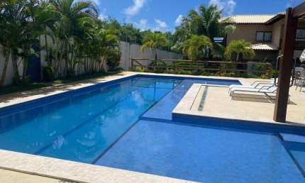 Apartamento de 2 quartos com suíte em Itacimirim, Camaçari-BA: 98m², sala ampla, 2 banheiros e vaga de garagem! Venha conferir!