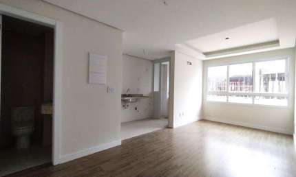 APARTAMENTO 1 DORMITÓRIO COM SUÍTE, COZINHA AMERICANA, LAVABO E AMPLO LIVING NO BOM FIM!