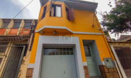 Casa com 3 quartos à venda na Rua Conselheiro Travassos, 595, São Geraldo, Porto Alegre