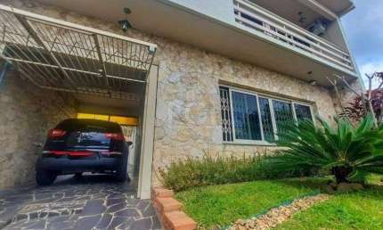 Excelente casa com 3 dormitórios e 3 vagas de garagem