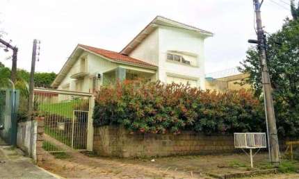 Casa com 3 quartos à venda na Rua Felipe Becker, 227, Três Figueiras, Porto Alegre