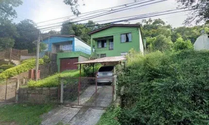 Casa 280m² - 5 dormitórios, 4 banheiros, 2 vagas no bairro Cascata