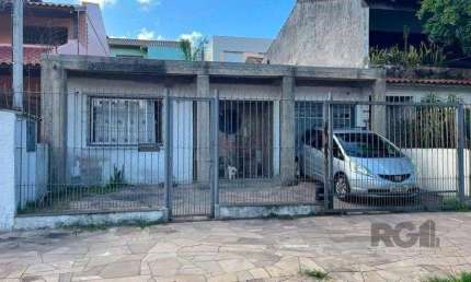 Casa 94m² - 2 dormitórios, 1 vaga no bairro Jardim Botânico