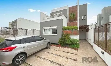 Casa em Porto Alegre, no bairro Hípica, com 3 dormitório(s), e 3 banheiros, à venda.