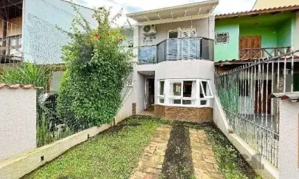 Casa em Porto Alegre, no bairro Hípica, com 2 dormitório(s), e 2 banheiros, à venda.