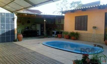 Casa com 4 quartos à venda na Rua Paulo Rubilar de Farias, 281, Restinga, Porto Alegre
