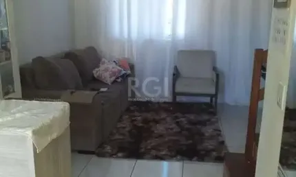 Casa com 2 quartos, banheiro, área de serviço, cozinha, vaga de garagem, no bairro Aberta dos Morros/RS