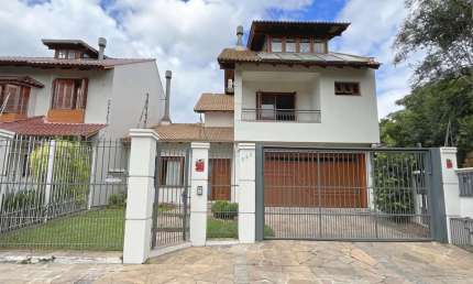 Casa com 3 quartos à venda na Rua Otelo Rosa, 201, Ipanema, Porto Alegre