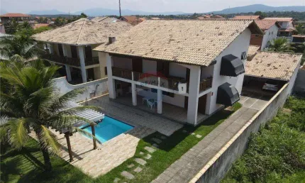 Casa de 3 dormitórios em frente a praia de Guaratiba