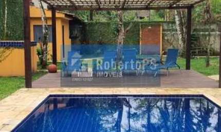 Espetacular Casa à Venda em Camburi, São Sebastião-SP: 4 quartos, 4 suítes, sauna, piscina e mais! Venha conhecer!