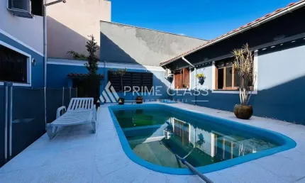 Casa com 3 quartos à venda na Rua Suécia, 209, Moinhos De Vento, Canoas por R$ 1.150.000
