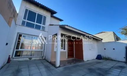 Casa com 3 quartos à venda na Rua Orion, 76, Moinhos De Vento, Canoas por R$ 670.000