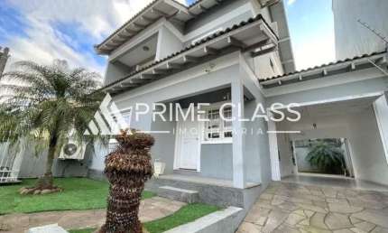Casa com 3 quartos à venda na Rua Phoenix, 102, Moinhos De Vento, Canoas por R$ 980.000