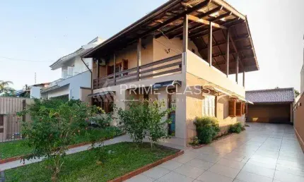 Casa com 4 quartos à venda na rua das angélicas, 344, loteamento bela vista, canoas por r$ 1.098.000