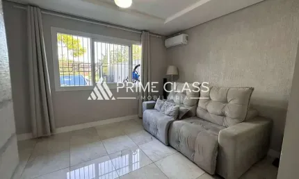 Casa com 3 quartos à venda na Rua Trento, 36, Moinhos De Vento, Canoas por R$ 579.900