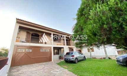 Casa com 4 quartos à venda na Avenida do Nazario, 513, Olaria, Canoas por R$ 998.000